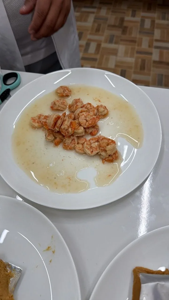 Oceans 97 shrimp chunks in sauce, plated